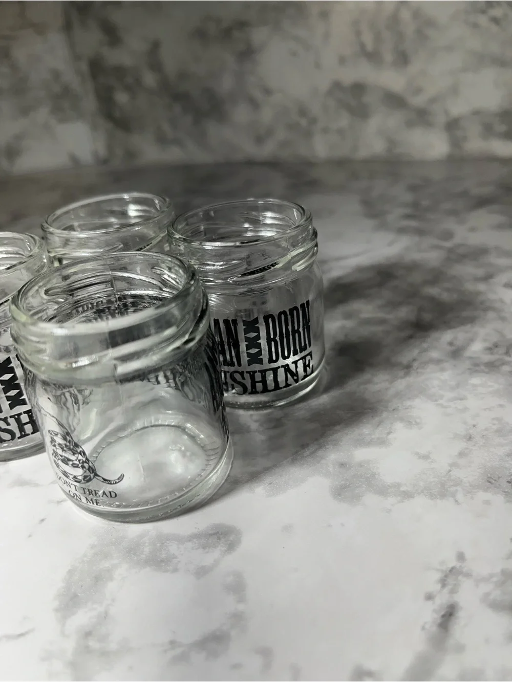 Set of 4 Clear Glass Shot Jars with Black Logo